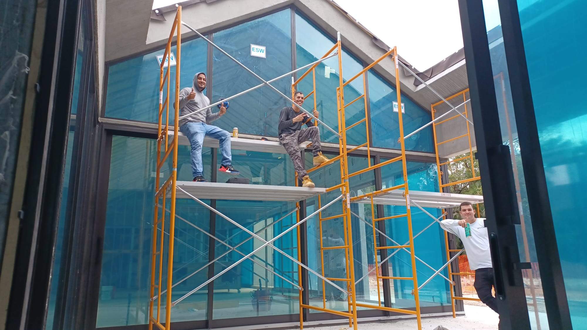 Technicians are upgrading impact windows in Miami.