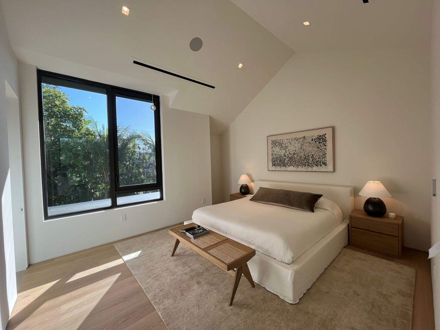 Modern bedroom with glass window